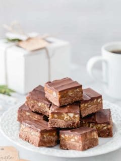 Turtle Fudge is rich, delicious and the perfect addition to any holiday dessert plate. The decadent layer of caramel and pecans makes it absolutely irresistible.