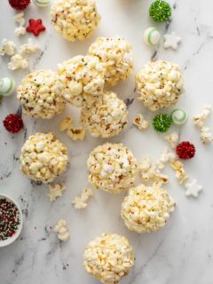 popcorn balls scattered on a marble countertop
