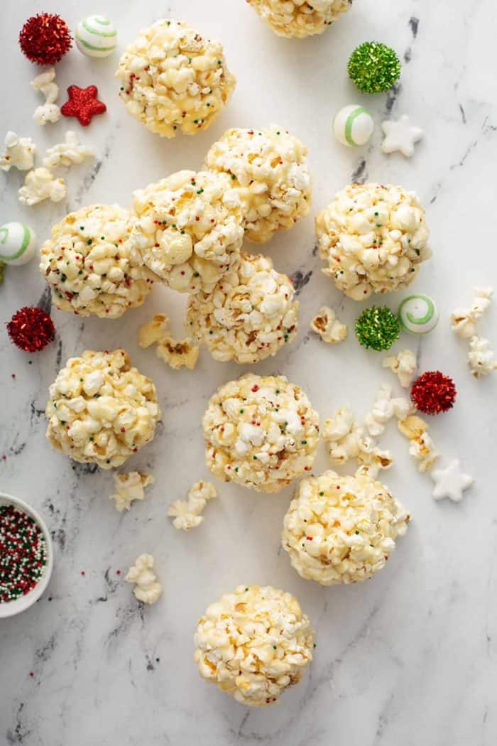 popcorn balls scattered on a marble countertop