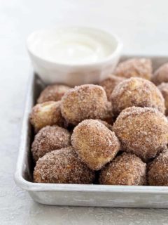 Cinnamon Sugar Soft Pretzel Bites are super simple to make. Serve them up with a side of cream cheese icing for the ultimate game day snack! So fun!