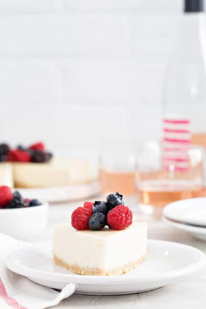 Rosé Cheesecake is rich, creamy, and full of flavor. Perfect for the Rosé lover in your life!