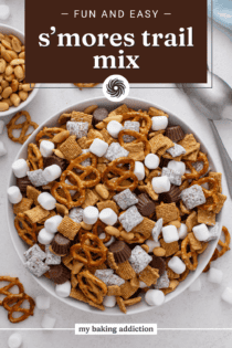 Overhead view of s'mores trail mix in a large white bowl. Text overlay includes recipe name.