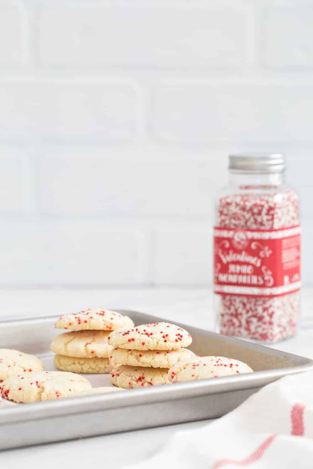 Easy Sugar Cookies come together in a snap! No chilling, rolling, or cookie cutters required! If you love sugar cookies, these are a must-make!