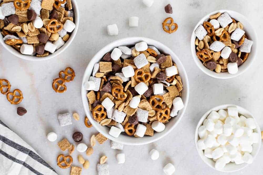 S'mores Snack Mix is sweet, salty and perfectly crunch! Basically a peanut butter and s'more lovers dream come true!