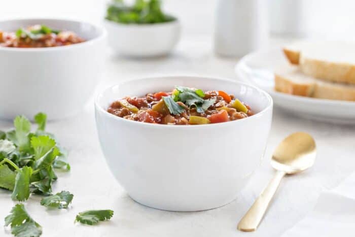 Stuffed Pepper Soup has all of the familiar flavors of traditional stuffed peppers, but it comes together with ease. Serve it up with dinner rolls and a green salad for the perfect cozy meal!