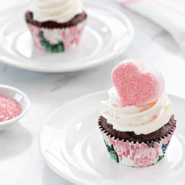 Valentine Marshmallow Cupcakes are a simple and delicious dessert for Valentine's Day. A sparkly marshmallow heart makes them love-ly!