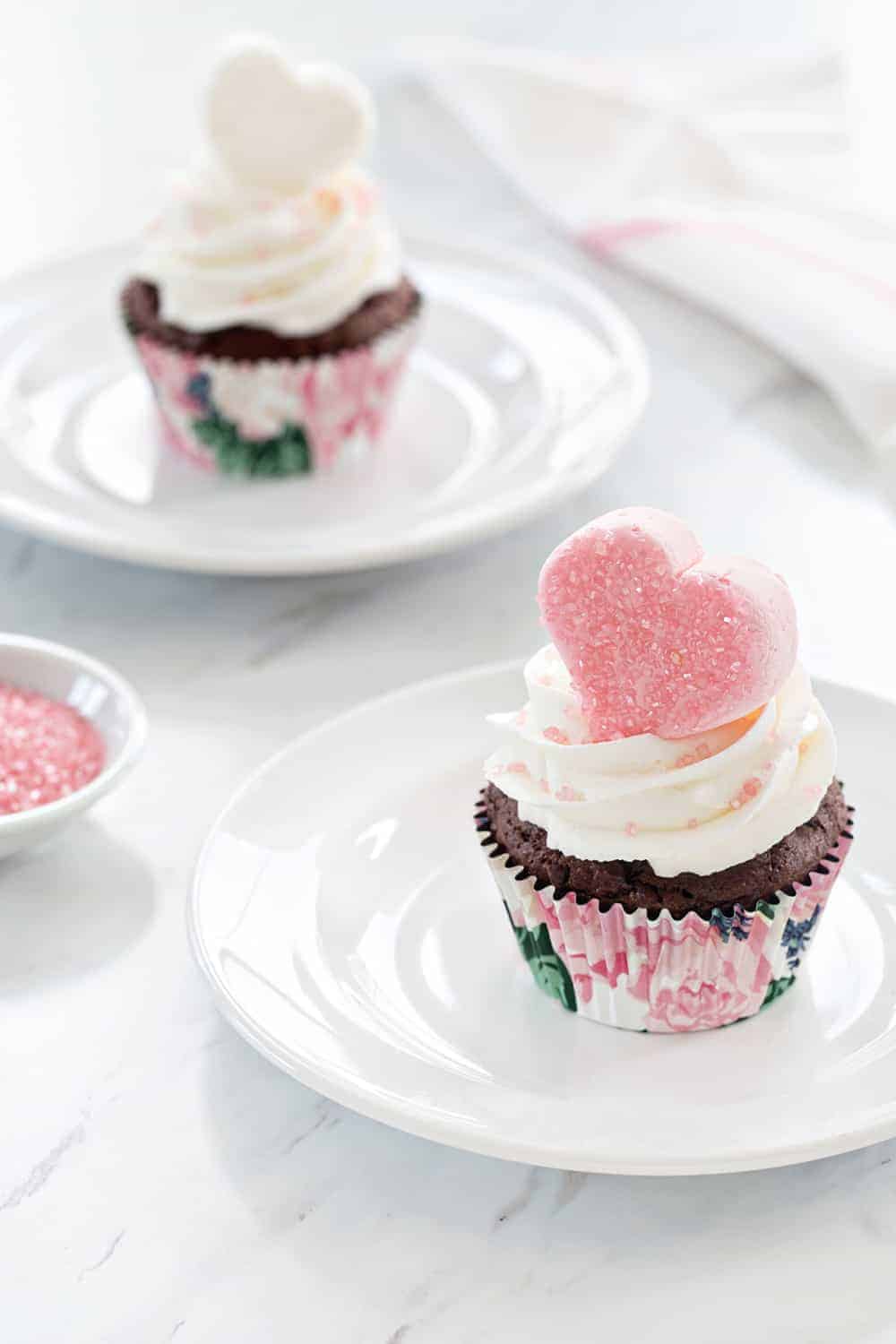 Valentine Marshmallow Cupcakes are a simple and delicious dessert for Valentine's Day. A sparkly marshmallow heart makes them love-ly!