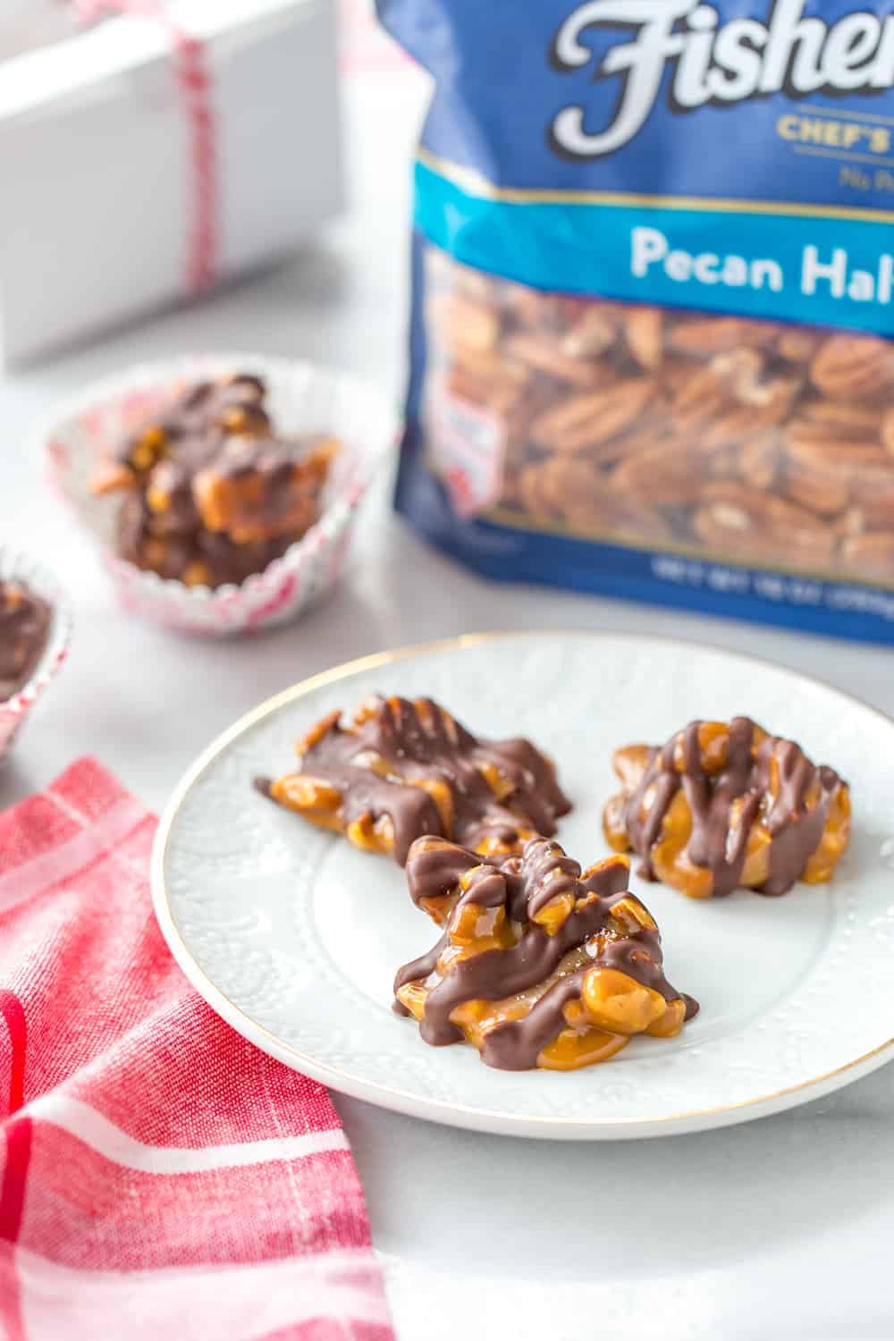 Caramel Pecan Clusters are salty, sweet and  they're perfect for gift giving. Package them up in a cute box with ribbon to really wow the caramel lover in your life!