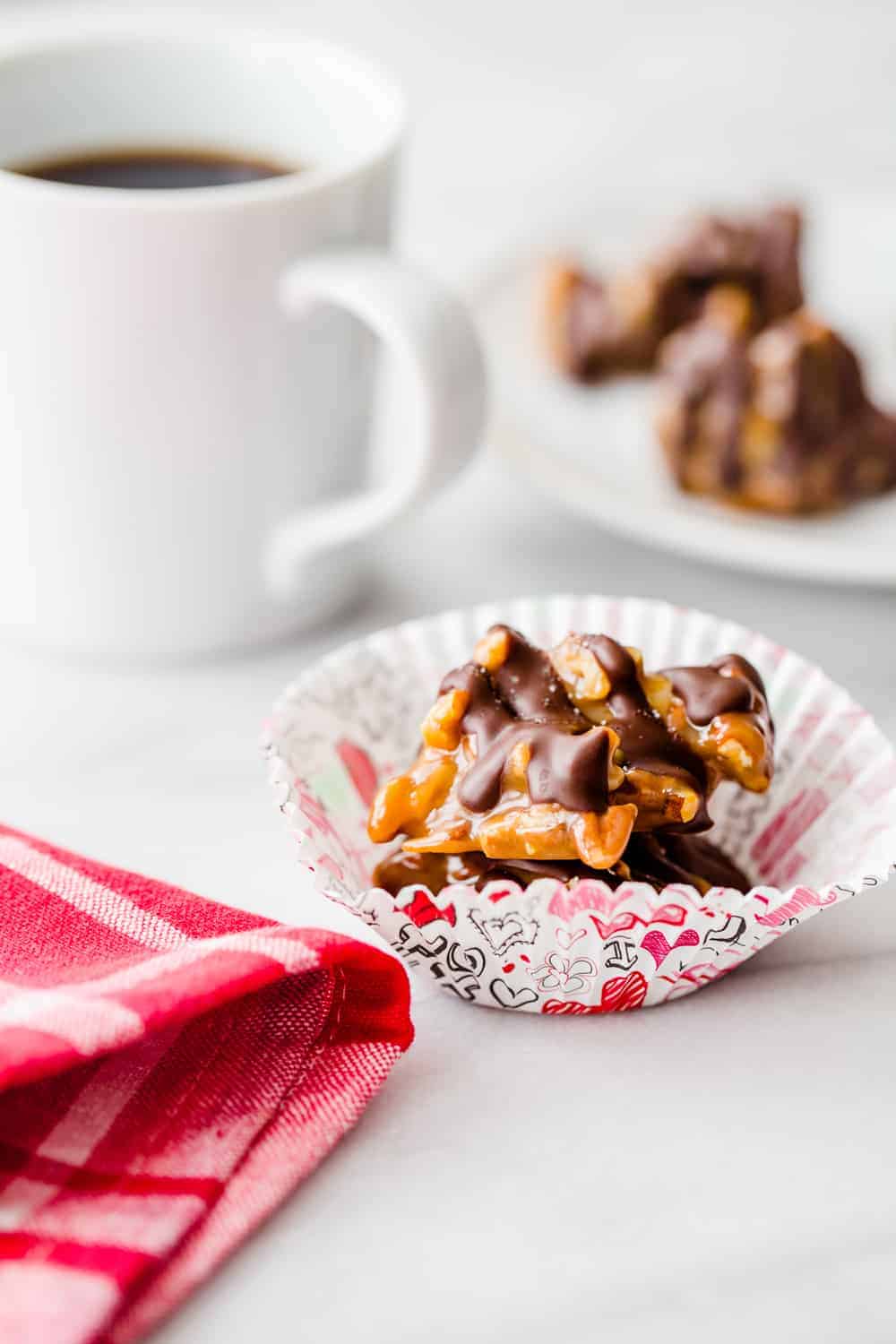 Caramel Pecan Clusters come together with just a handful of ingredients. They're sweet, salty and totally perfect for gift giving.