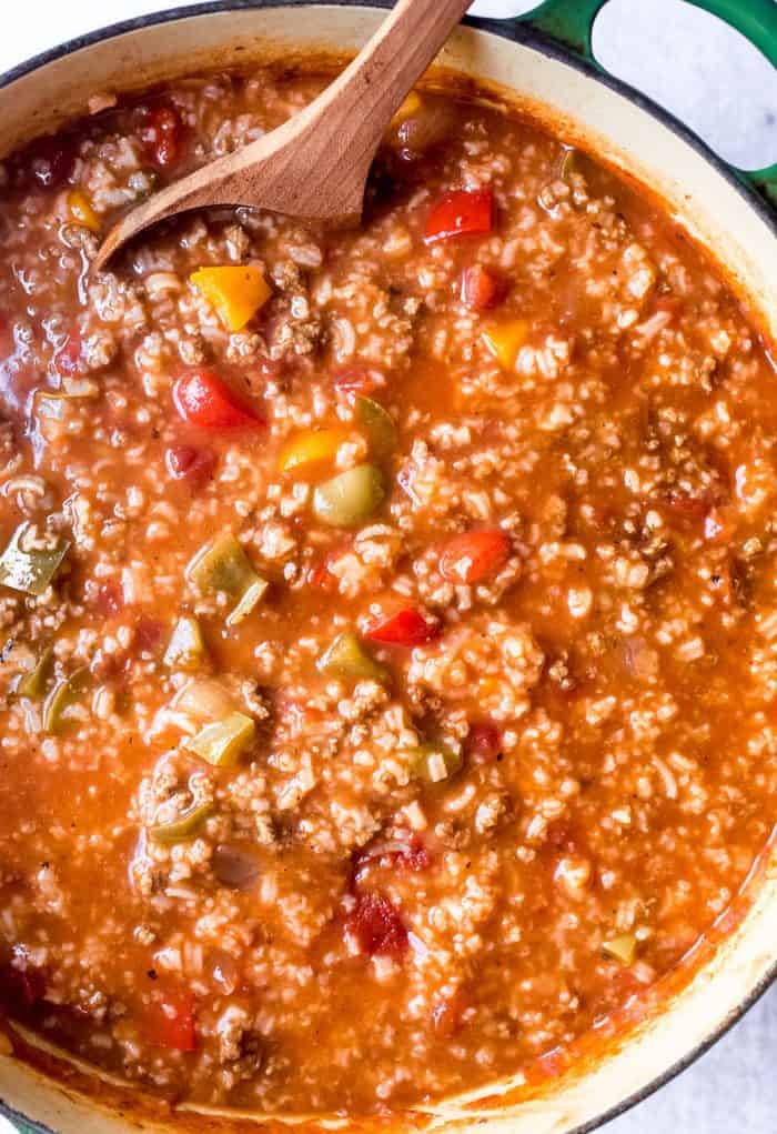 Spoon stirring a pot of stuffed pepper soup