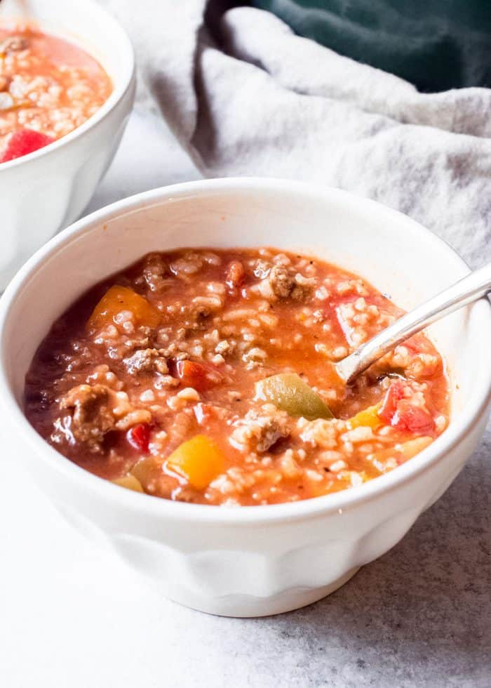 Close up of stuffed pepper soup in a white bowl