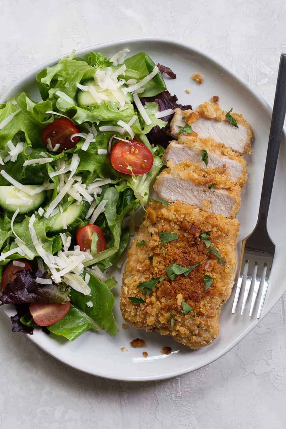 Easy Baked Pork Chops are as simple as they are delicious. Serve them up with potatoes and a crisp salad for weeknight dinner perfection. 