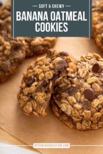 Halved banana oatmeal cookie propped against two stacked cookies on a piece of parchment paper. Text overlay includes recipe name.