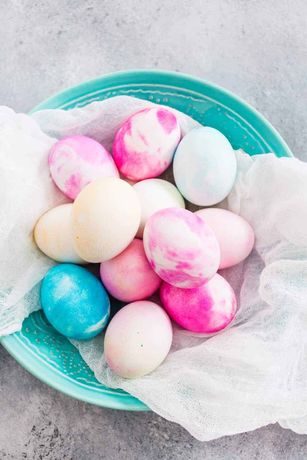 Whipped Cream Dyed Eggs are super simple and so much fun.  The perfect family craft!