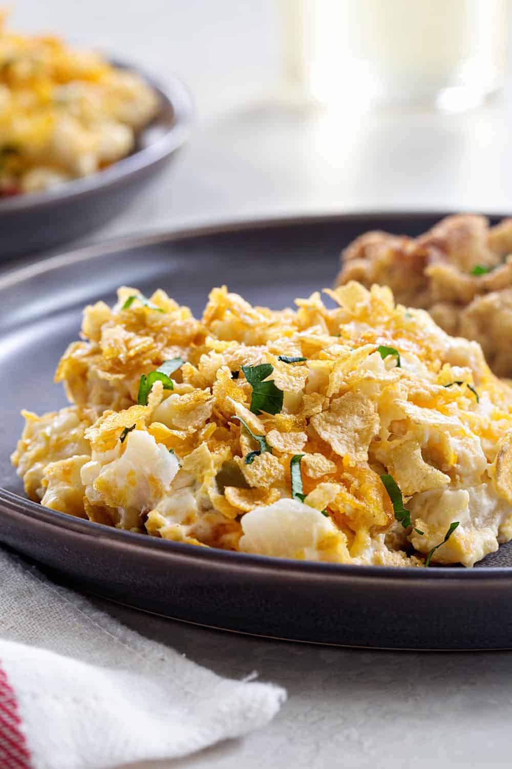 Hash Brown Casserole comes together in less than 10 minutes with just a handful of ingredients. Serve them up with pork chops or chicken for a simple dinner!