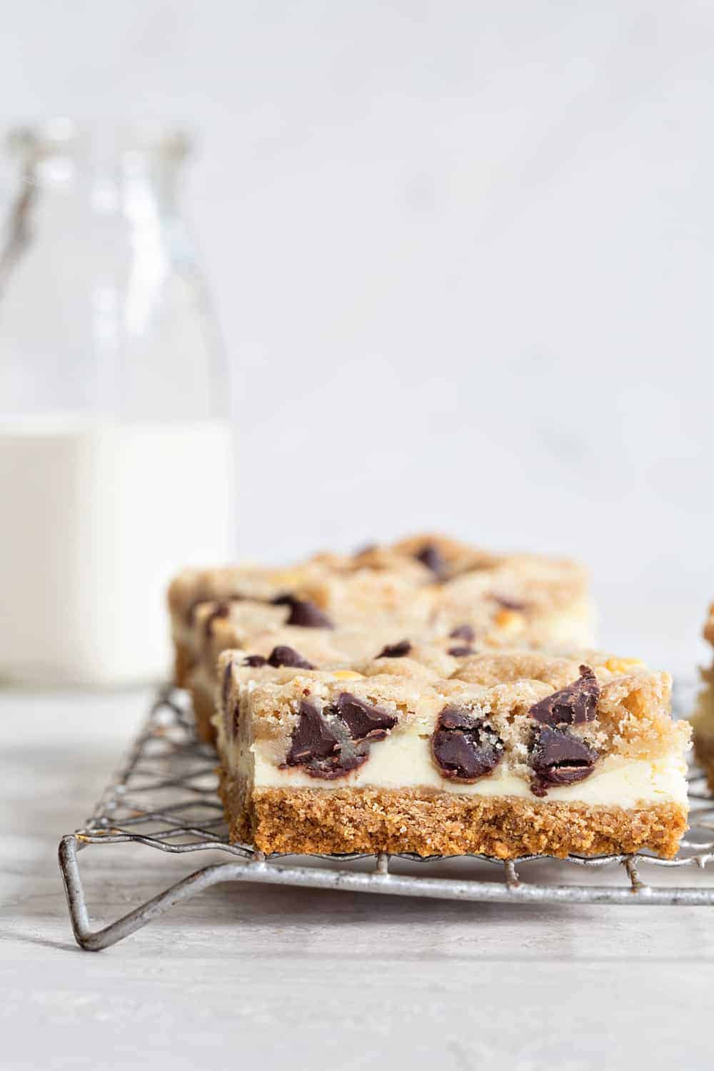 Cookie Dough Cheesecake Bars are fun twist on two classic desserts. So delish!