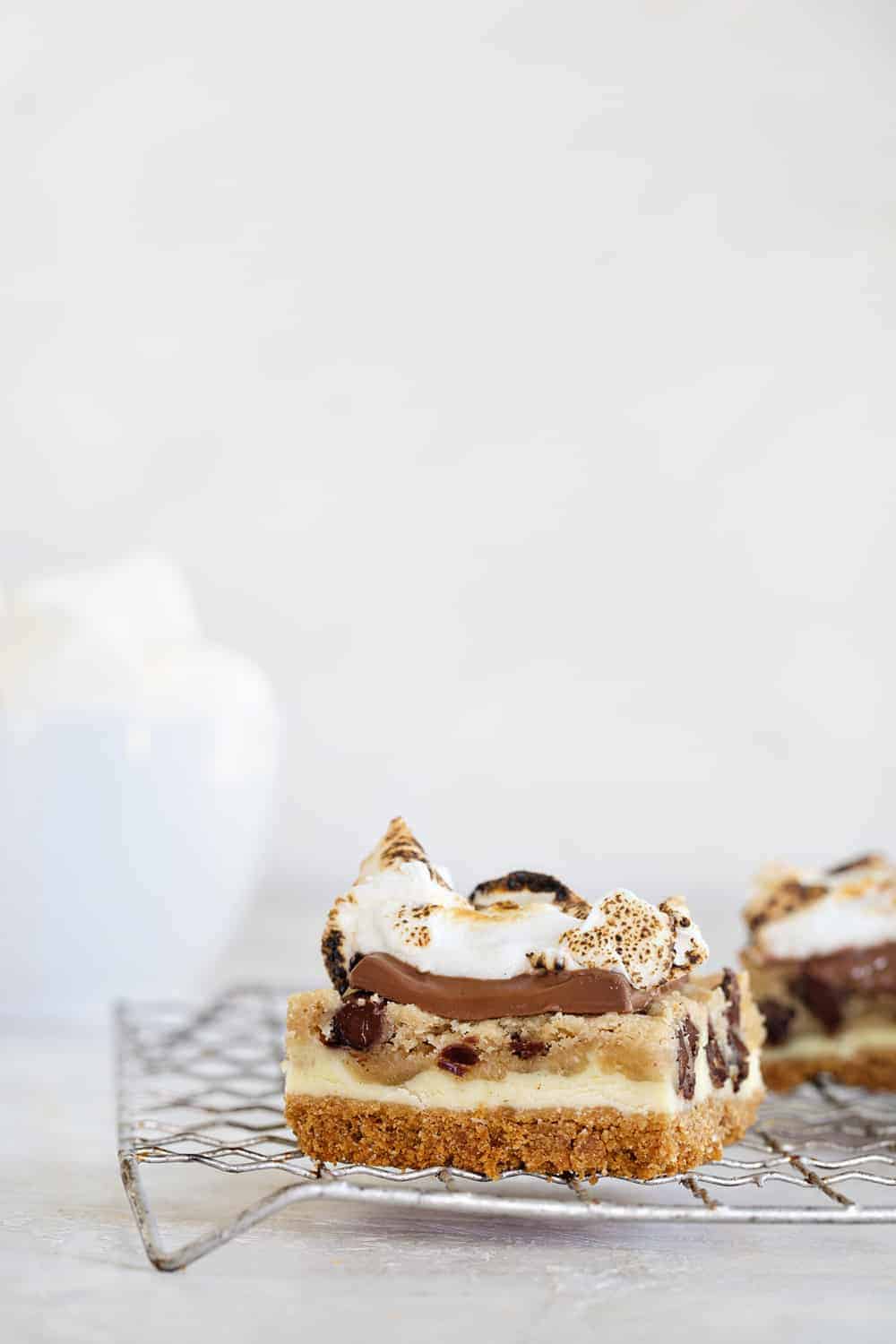 Cookie Dough Cheesecake S'mores combine three classics into one incredible desserts. You guys are going to LOVE this one.