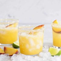 Sparkling Peach Margaritas are the perfect way to celebrate summer. They're light, sweet and bursting with fresh peach flavor!