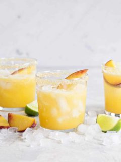 Sparkling Peach Margaritas are the perfect way to celebrate summer. They're light, sweet and bursting with fresh peach flavor!