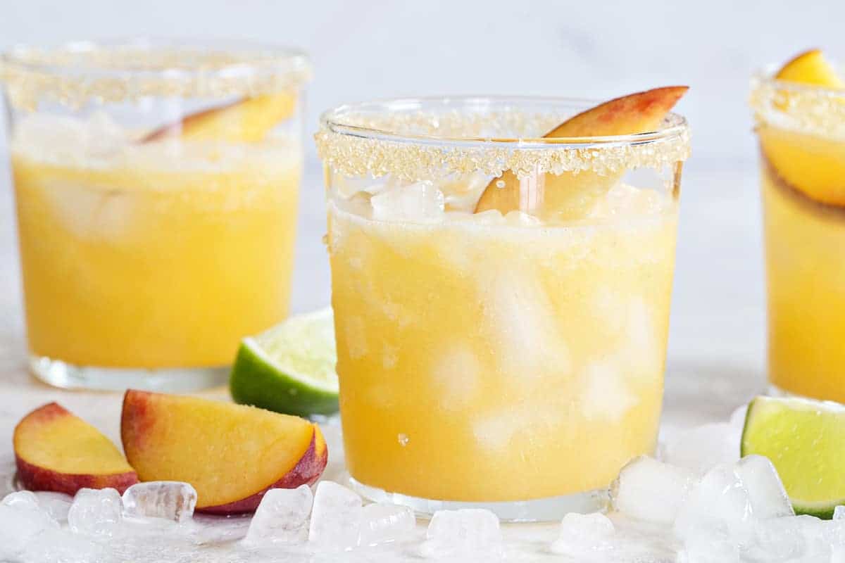 Sparkling Peach Margaritas are the perfect way to celebrate the season! Fresh, fruity and totally delicious!