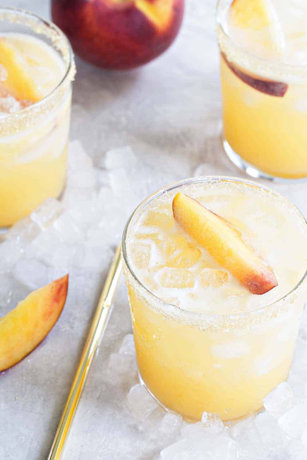 Sparkling Peach Margaritas are the perfect way to celebrate summer.  Simple and delicious!