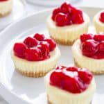 Mini Cherry Almond Cheesecakes are a simple and delicious sweet treat for just about any occasion. They're fun to make, and even more fun to eat!