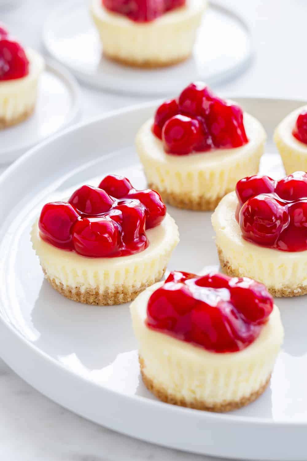 Mini Cherry Almond Cheesecakes are a simple and delicious sweet treat for just about any occasion. They're fun to make, and even more fun to eat!