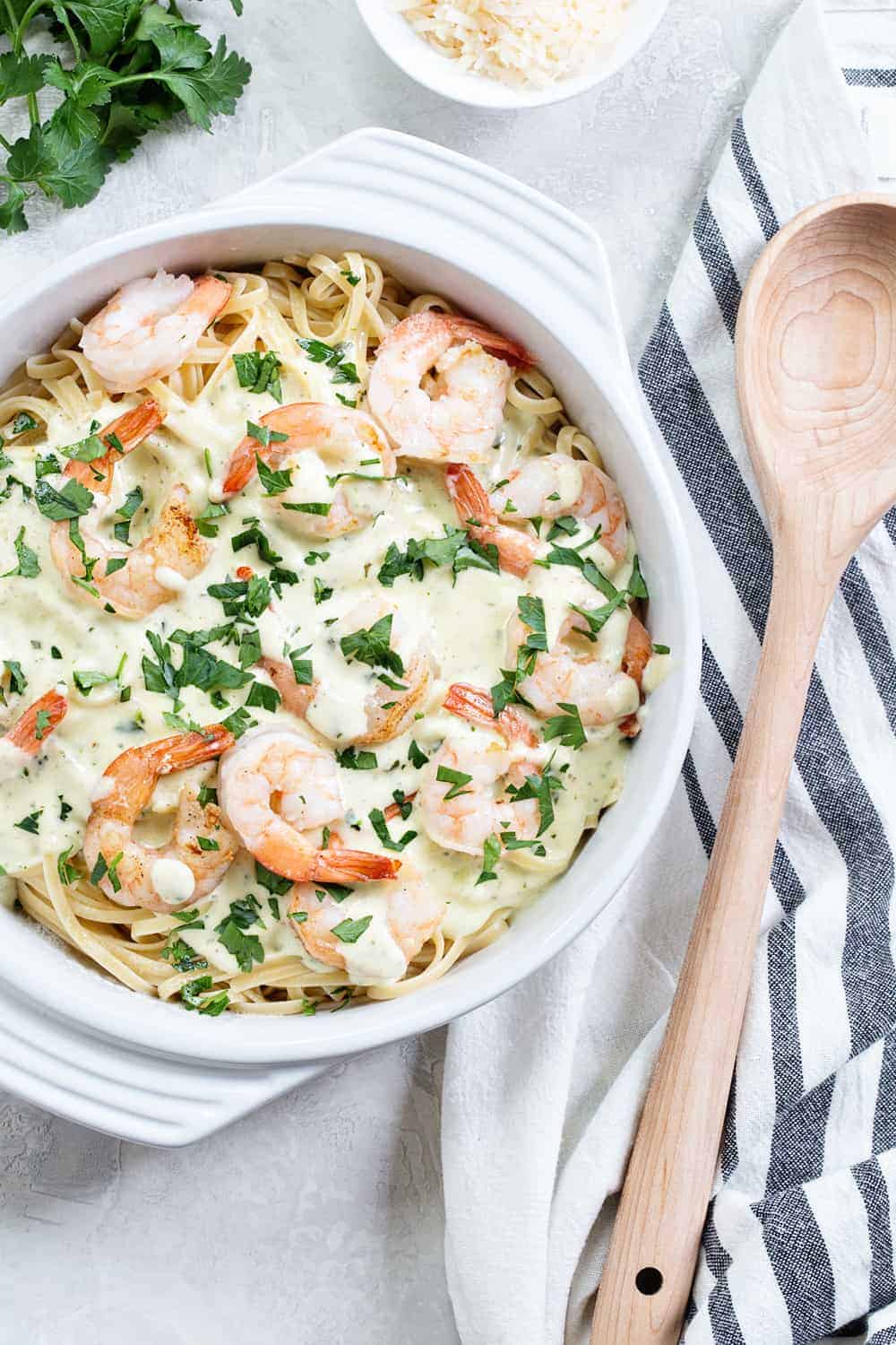 Creamy Pesto Pasta with Shrimp combines butter, cream, parmesan and basil pesto to create a delightful pasta dish that's perfect any night of the week.