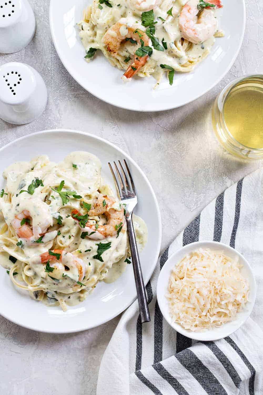 Creamy Pesto Pasta with Shrimp is simple and delicious. It's perfect for entertaining, or just a Tuesday night. 