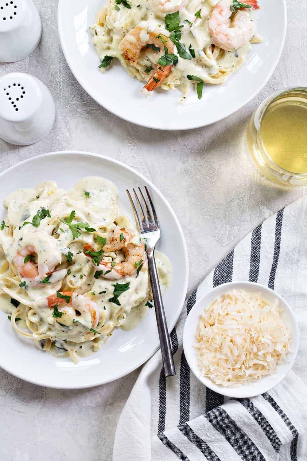 Creamy Pesto Pasta with Shrimp is simple and delicious. It's perfect for entertaining, or just a Tuesday night.