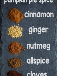 Ingredients to make pumpkin spice on a stone surface