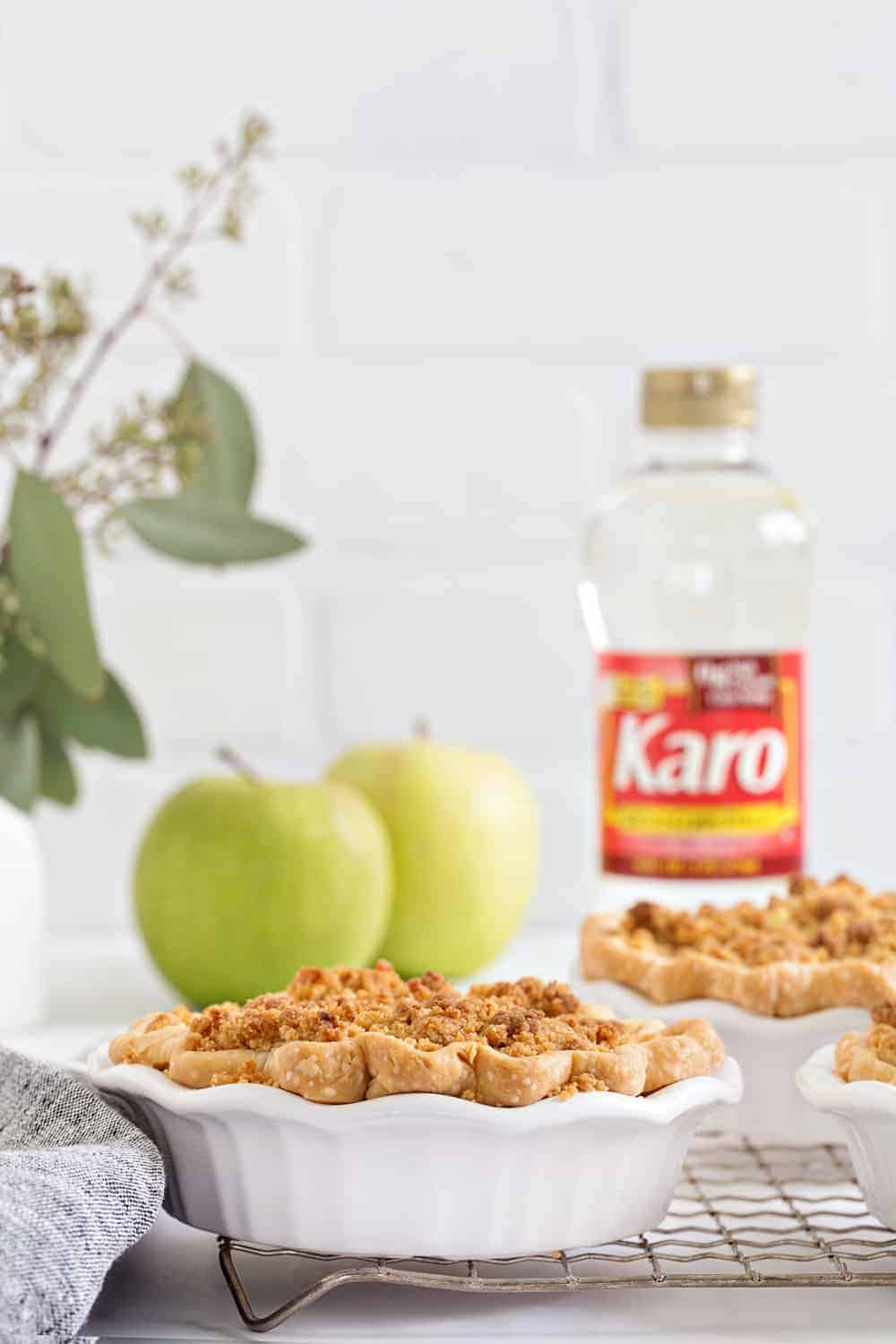 Mini Apple Pies are a fun twist on traditional apple pie. The crumb topping will have your guests begging for more!