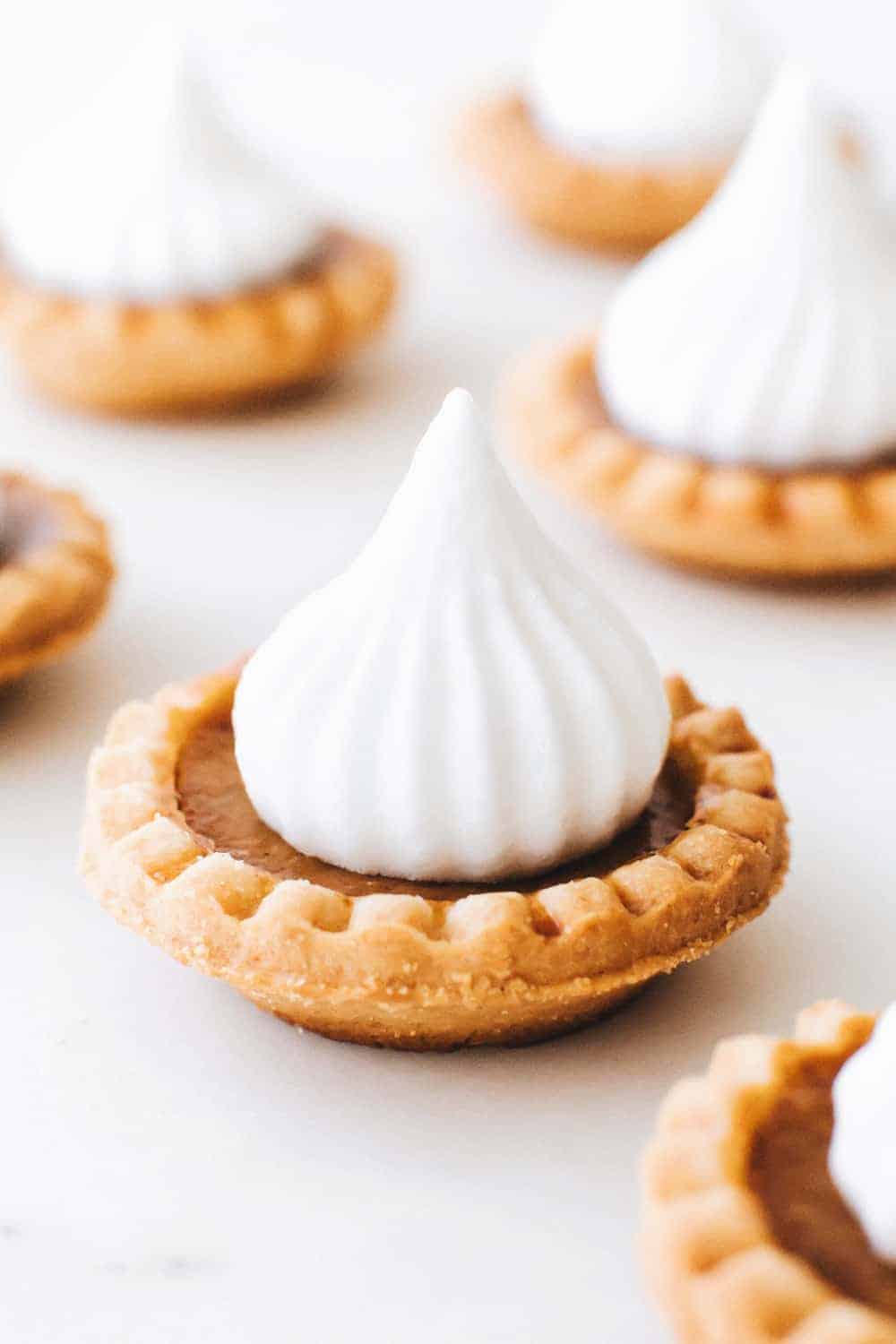 Mini Pumpkin Pies are an entire pumpkin pie in ONE bite! Simple and so delicious!