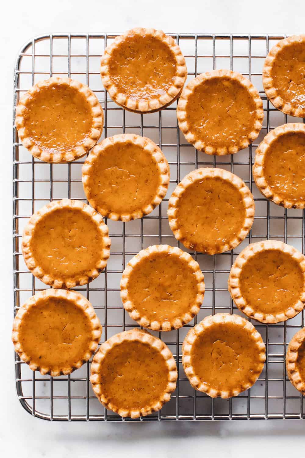 Mini Pumpkin Pies are an entire pumpkin pie in ONE bite! Perfect for entertaining!