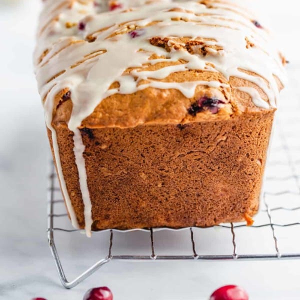 Cranberry Orange Bread is both sweet and tart, bursting with fresh cranberries and the flavor of oranges.
