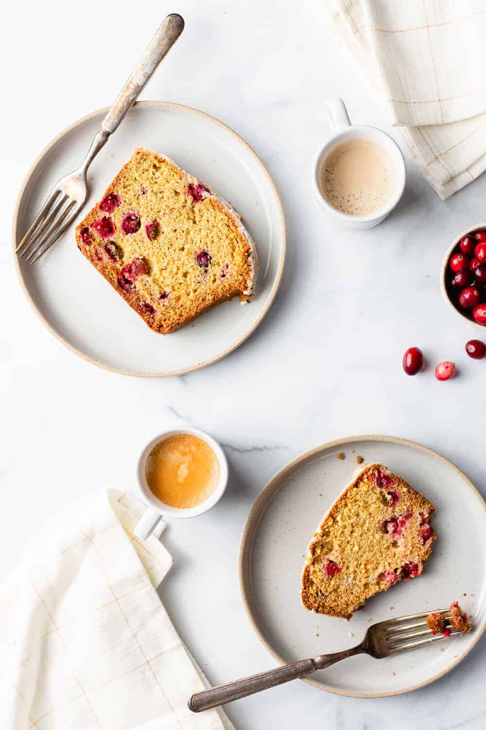 Cranberry Orange Bread is the perfect for the holiday season. Bursting with festive flavor, it's sure to become a new favorite!