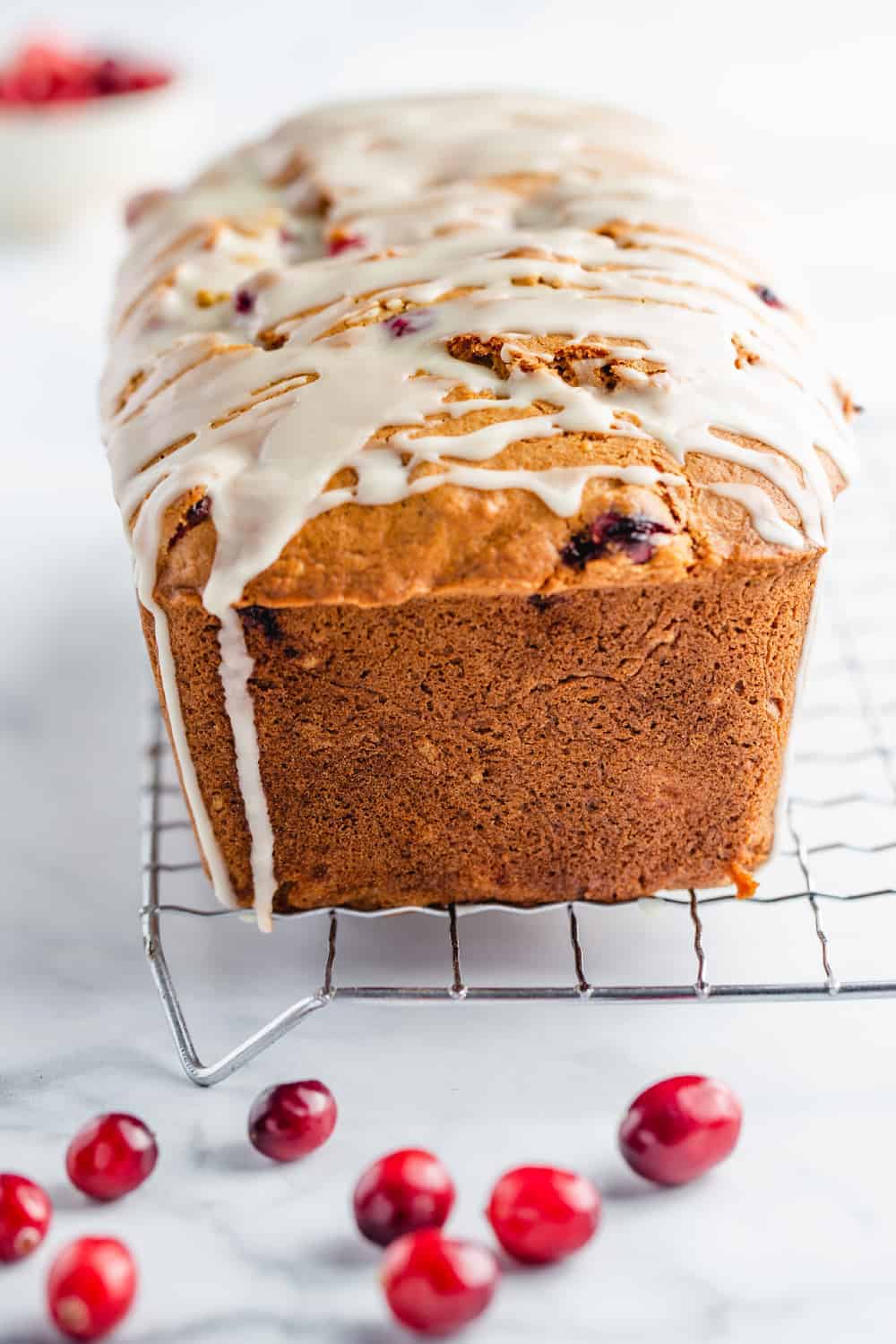 Cranberry Orange Bread is both sweet and tart, bursting with fresh cranberries and the flavor of oranges.