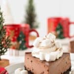 Hot Cocoa Cheesecake has all of the flavors of a cup of hot cocoa in a rich, creamy, chocolate cheesecake! You'll love everything about it, especially the fluffy marshmallows on top!