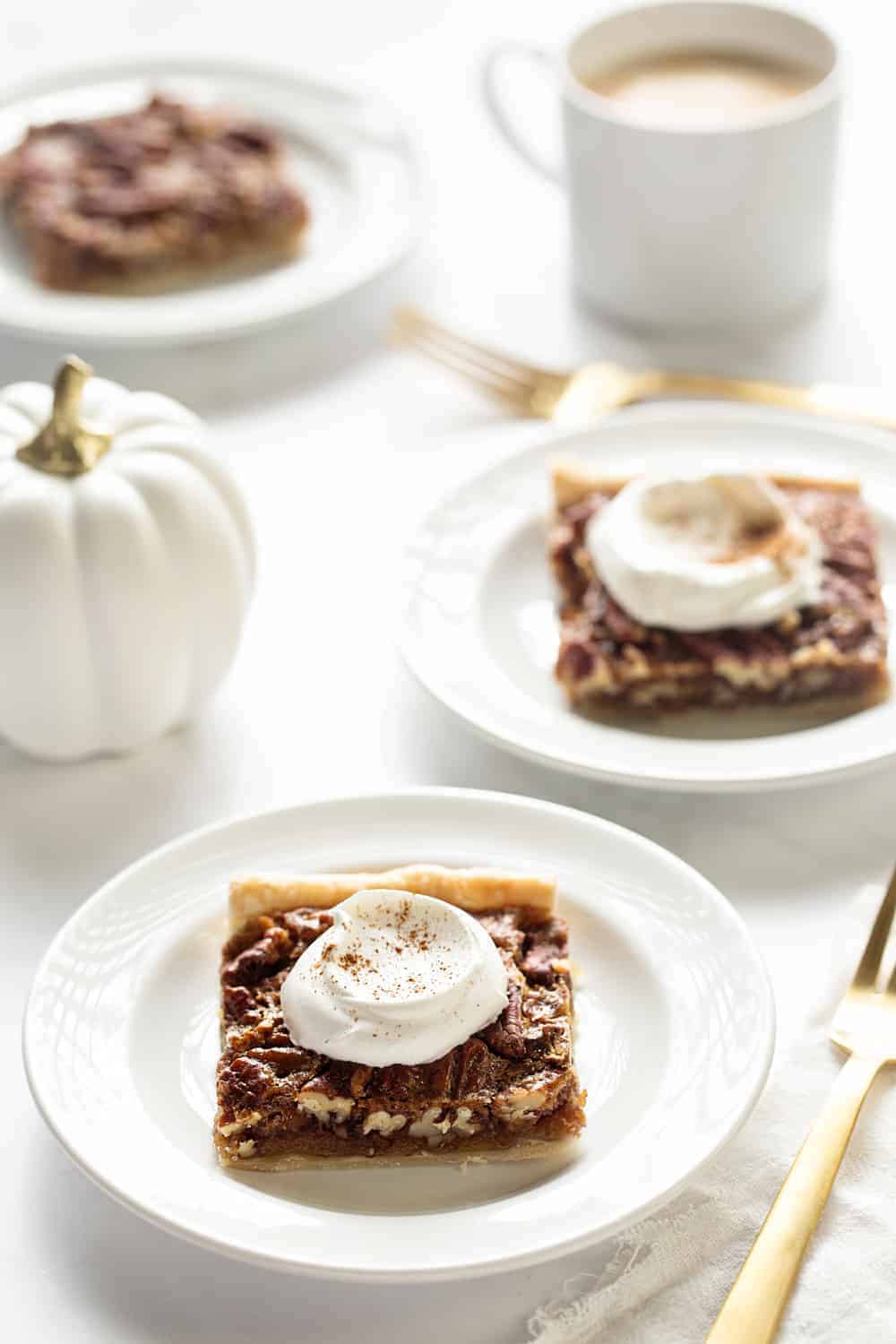 Pecan Slab Pie is the perfect dessert to feed a Thanksgiving crowd. It comes together in less than 20 minutes!