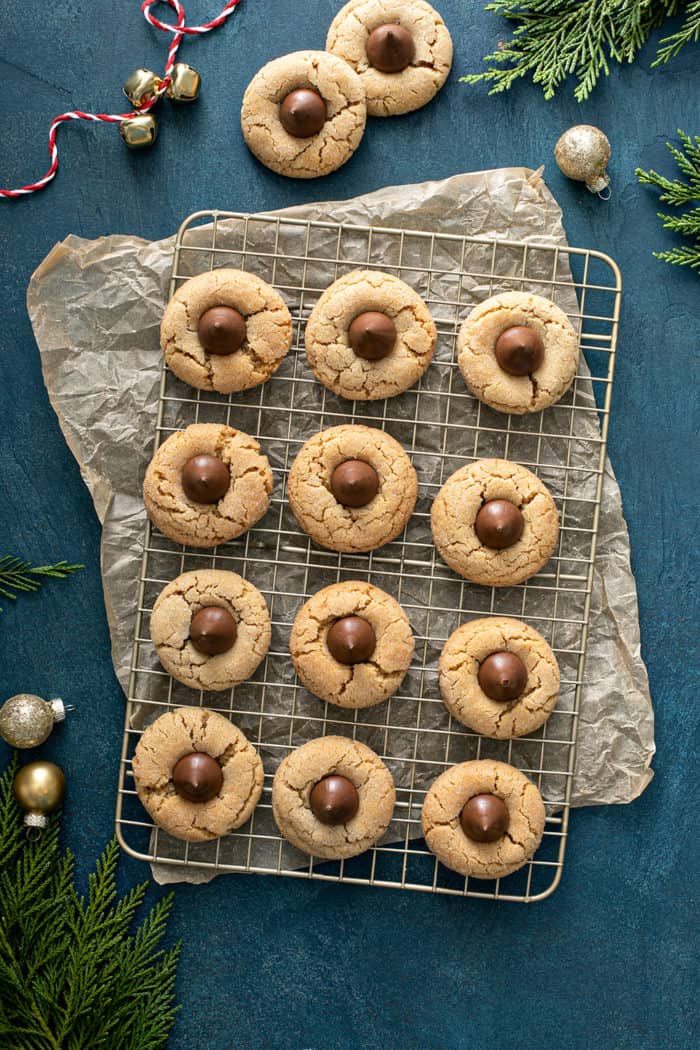 Peanut butter blossoms cooling on a wire rack