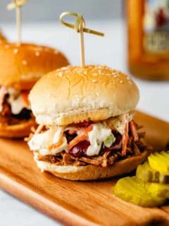 Whether you forgot to get dinner started early or had a last minute craving strike, you can still have pulled pork sandwiches for dinner thanks to the Instant Pot! Instant Pot Pulled Pork is every bit as delicious as the slow cooked version but comes together in a fraction of the time.