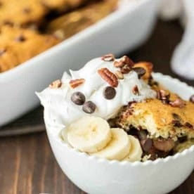 Banana Split Dump Cake is the best dessert ever!! This dump cake is thrown together in minutes with just 6 ingredients and is sure to be an instant crowd pleaser!