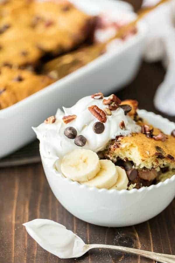 Banana Split Dump Cake is the best dessert ever!! This dump cake is thrown together in minutes with just 6 ingredients and is sure to be an instant crowd pleaser! 