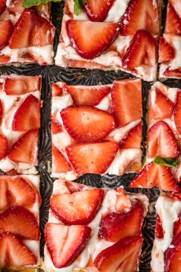 Close-up of sliced puff pastry strawberry tart