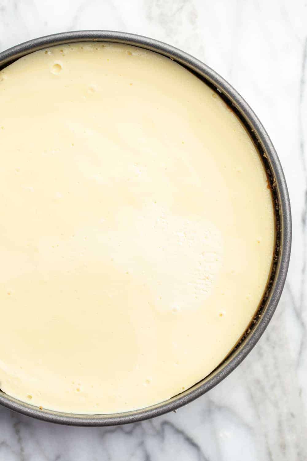 overhead view of baked vanilla cheesecake