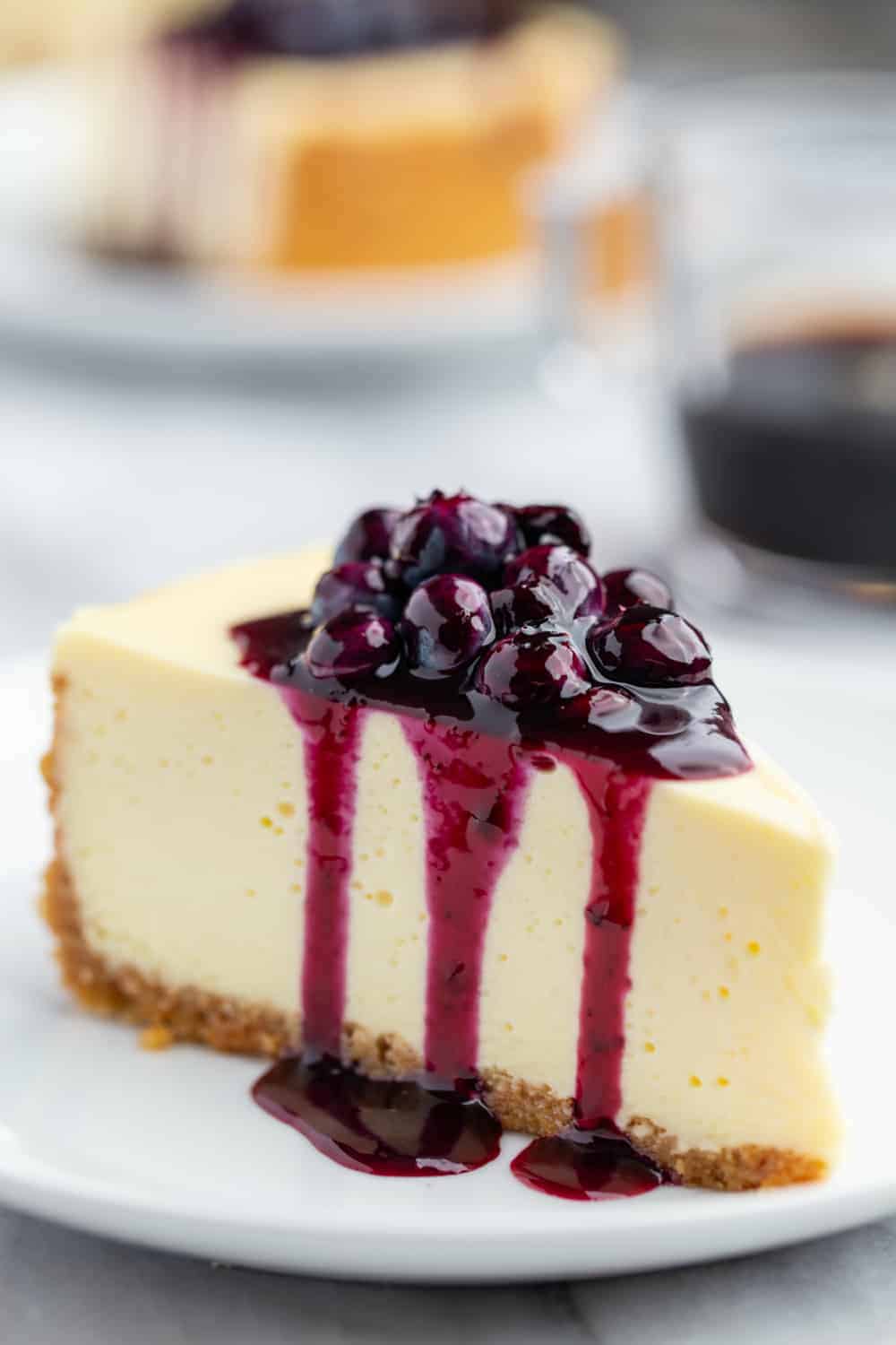 https://www.mybakingaddiction.com/wp-content/uploads/2019/07/Cheesecake-with-Blueberry-Sauce-57-of-61_resized.jpg