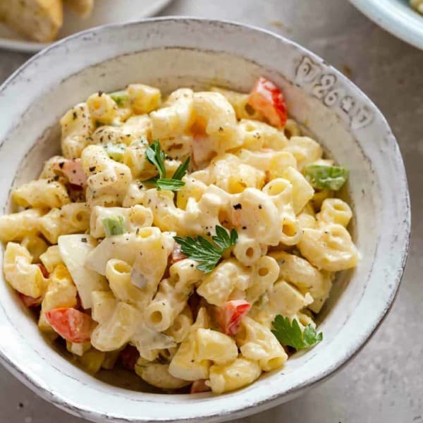 Bowl of macaroni salad close up