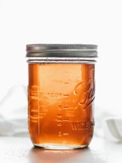 Vanilla coffee syrup in a glass mason jar
