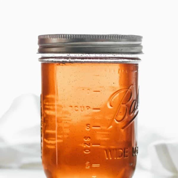 Vanilla coffee syrup in a glass mason jar