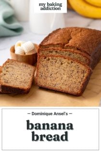 Loaf of dominique ansel's banana bread cut into slices. Text overlay includes recipe name.